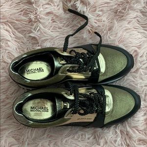 Micheal kors tennis shoes. Never worn. Size 8